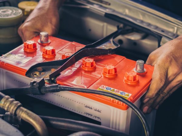 A,Car,Mechanic,Replaces,A,Battery
